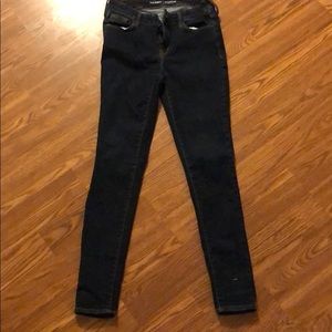 Dark wash rock star jeans with gold threading